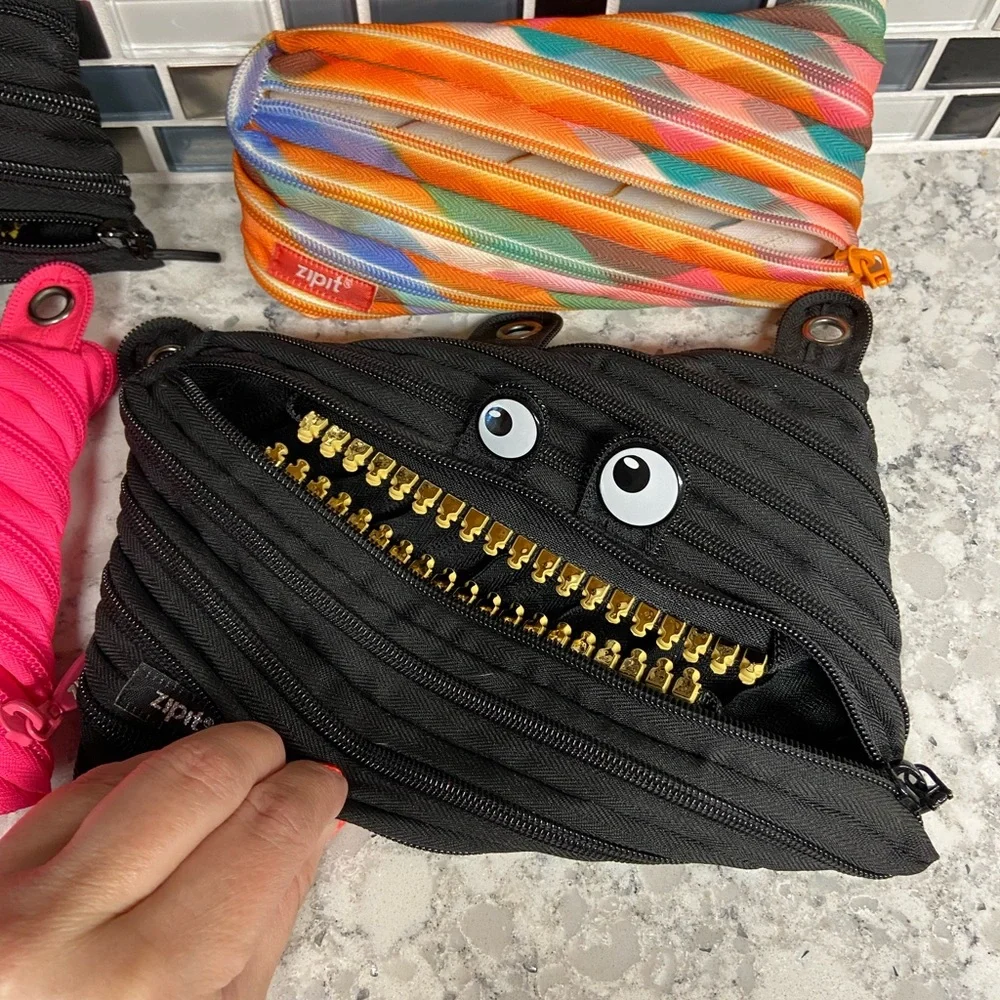 NWT Monster Grillz Pencil Case Set - 1 Pink, 2 Black and Orange multi color.